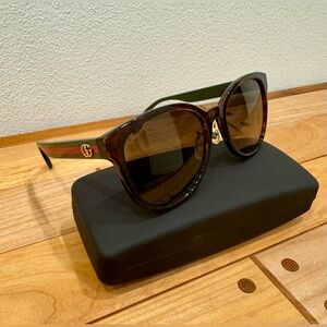 Gucci Women’s Sunglasses in Havana Tortoise with Web Detail on Temples